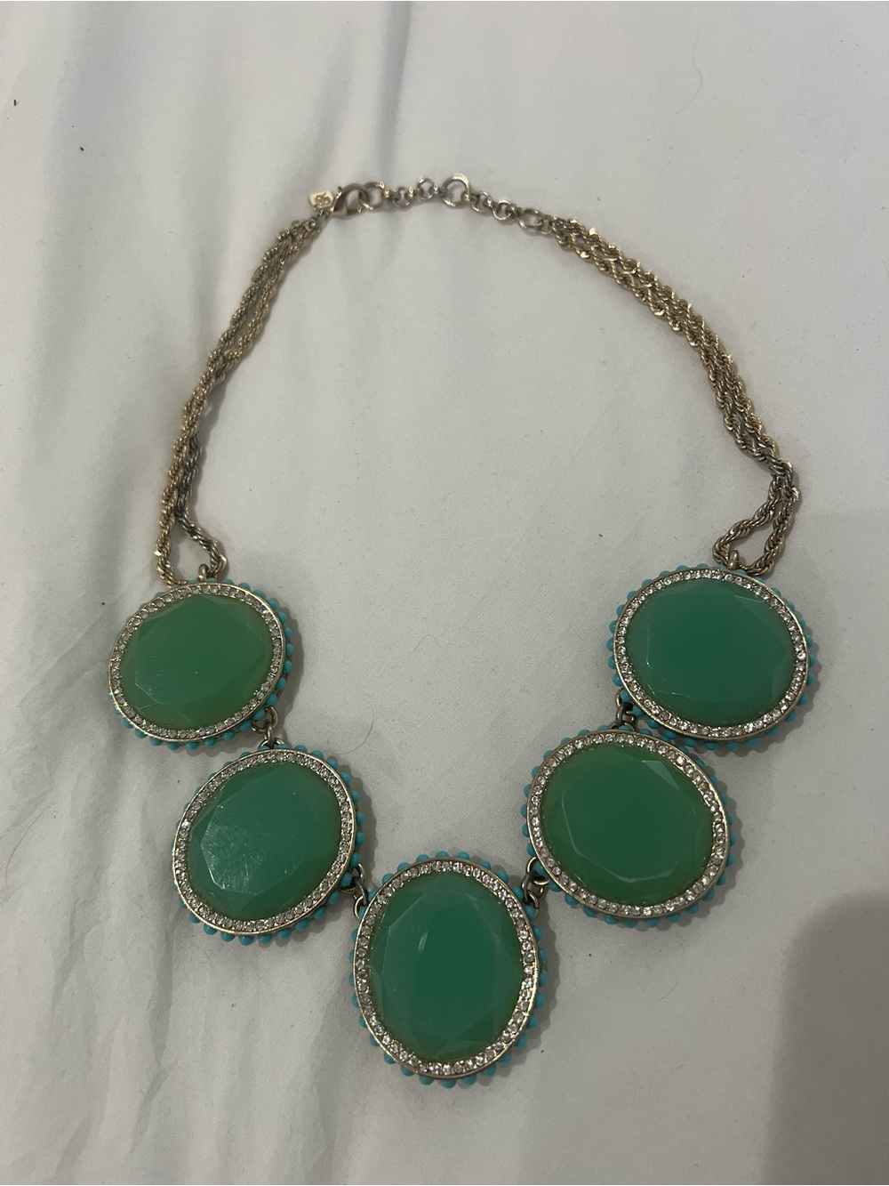 Banana Republic statement necklace featuring five green circular resin cabochons